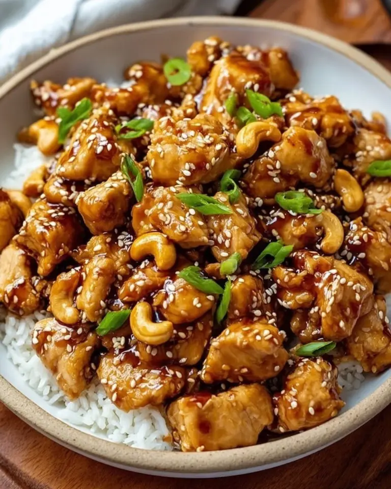 Savory slow cooker cashew chicken dish served with vegetables