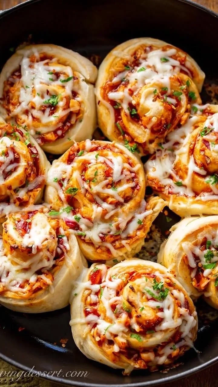 Cheesy chicken pizza rolls served on a plate