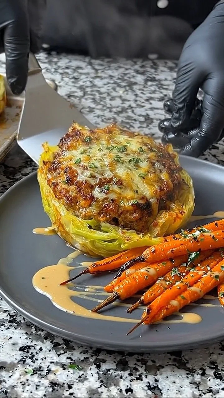 Oven-baked cabbage burgers served with fresh toppings on a plate