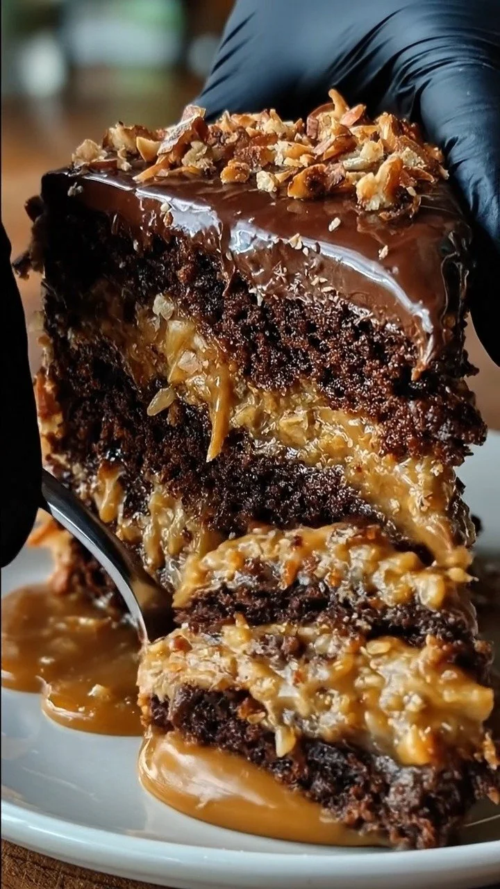 Slice of German Chocolate Cake with coconut-pecan frosting