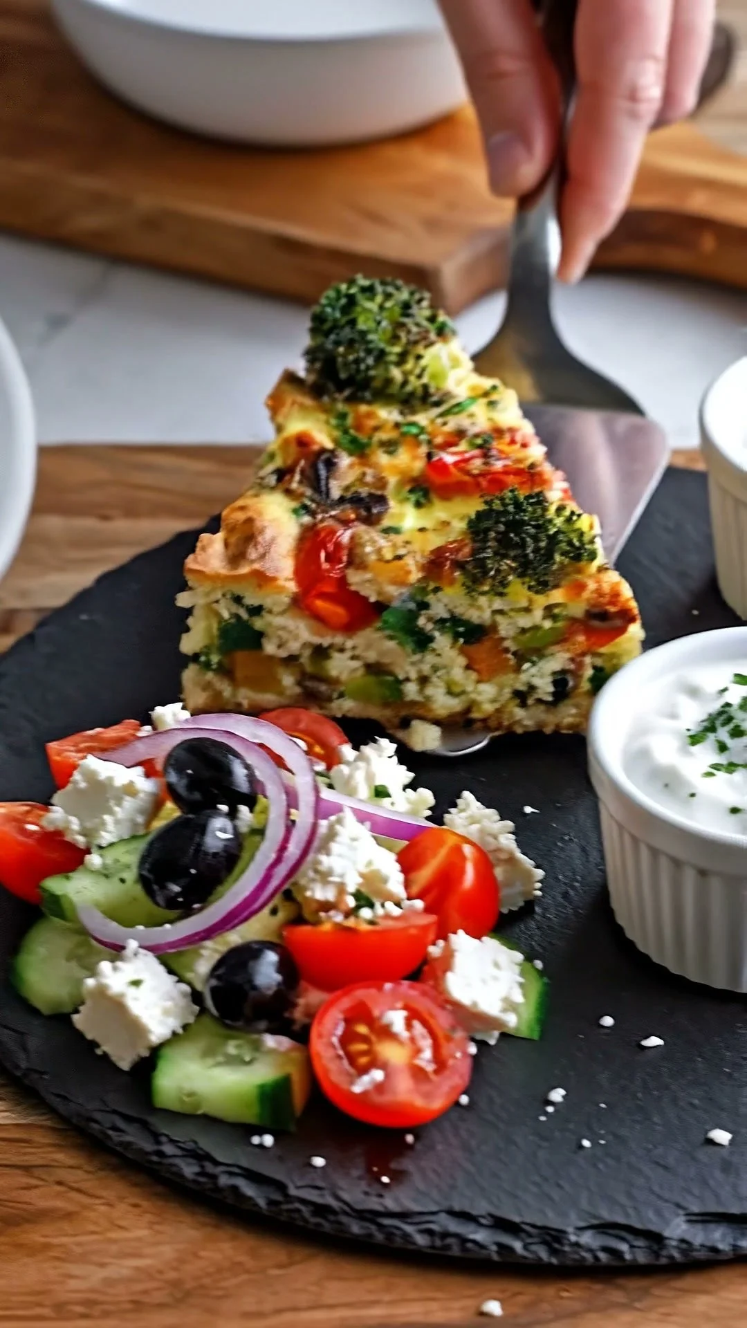 Mediterranean Cottage Cheese Veggie Bake topped with fresh vegetables and herbs
