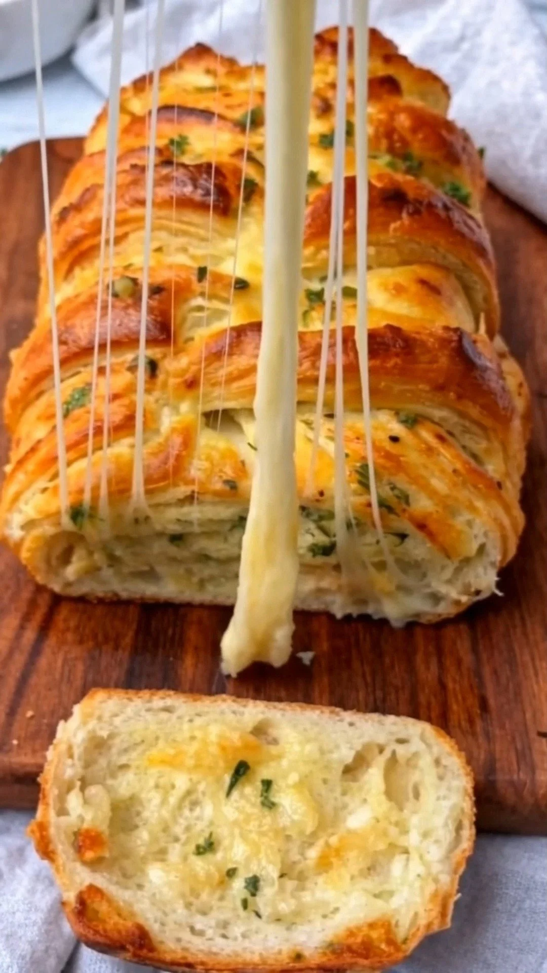 Pull-Apart Garlic Bread with melted butter and herbs, ready to enjoy.
